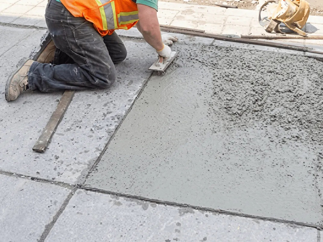 Professional repairing a concrete floor in Eugene, OR